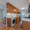 Kitchen showing washer/dryer