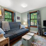 Den features a futon to use as a second bedroom.