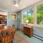 Entrance to the cabin is through the porch, with direct access to the living room.