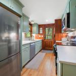 Dishwasher and refrigerator/freezer. Kitchen has a full supply of dishes, glassware, flatware, utensils, pots and pans.